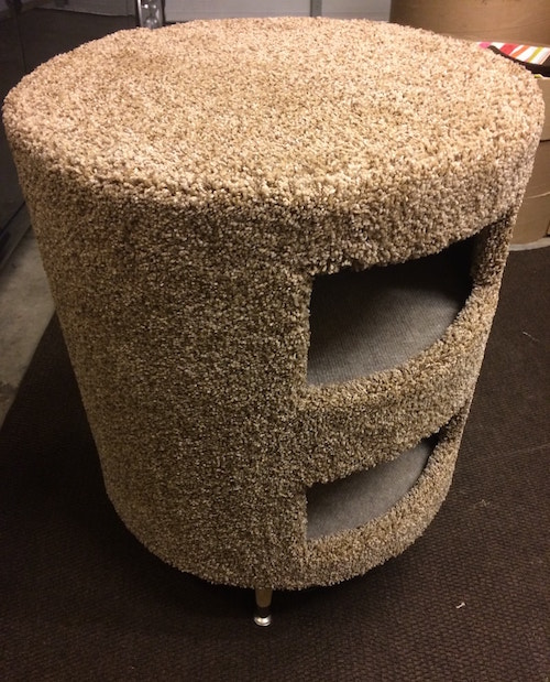 top view of a round carpeted two-story cat condo.